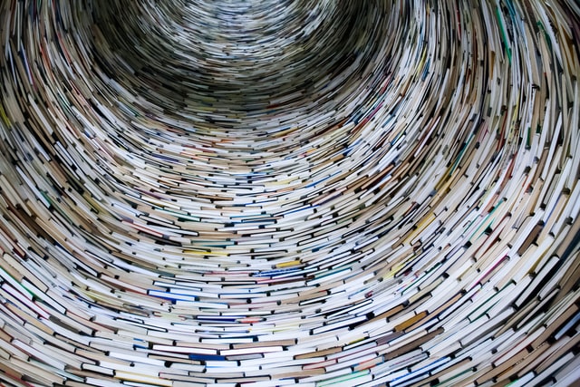 a huge cylinder made of books